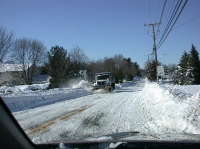 City snow plow coming to rescue!